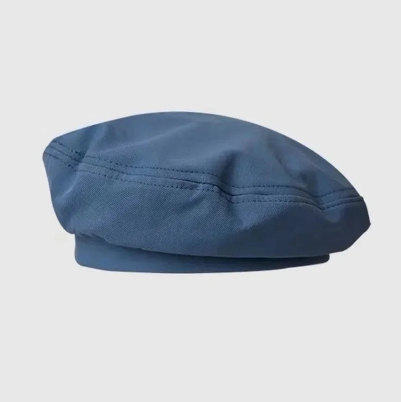Blue beret hat.