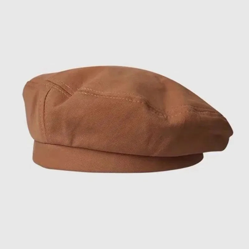 Brown beret-style hat.