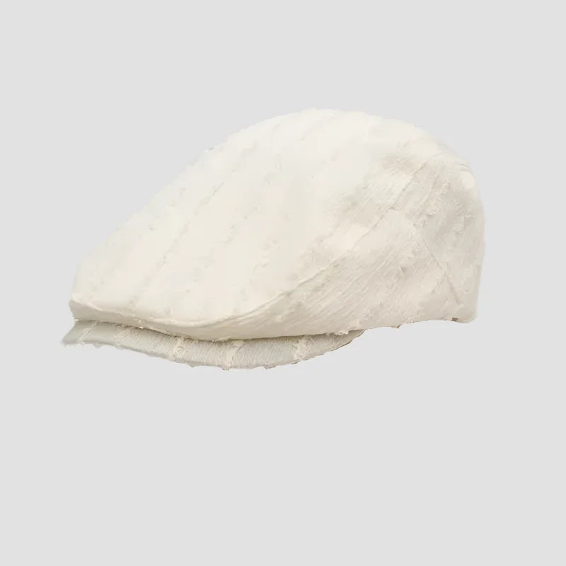 Off-white flat cap.