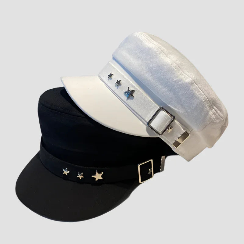 Stacked black and white star-studded hats.
