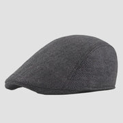 Gray herringbone flat cap.