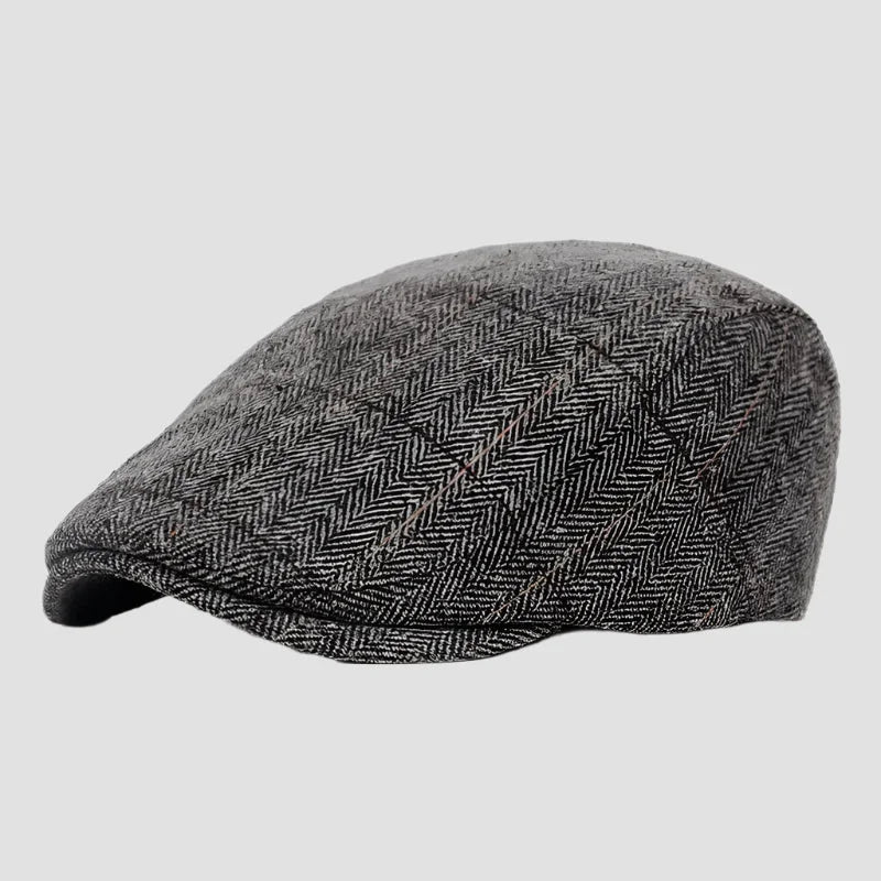 Gray herringbone flat cap.