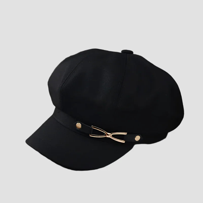 Black baker boy hat with gold accent.