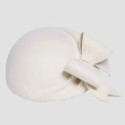 Cream-colored hat with bow.