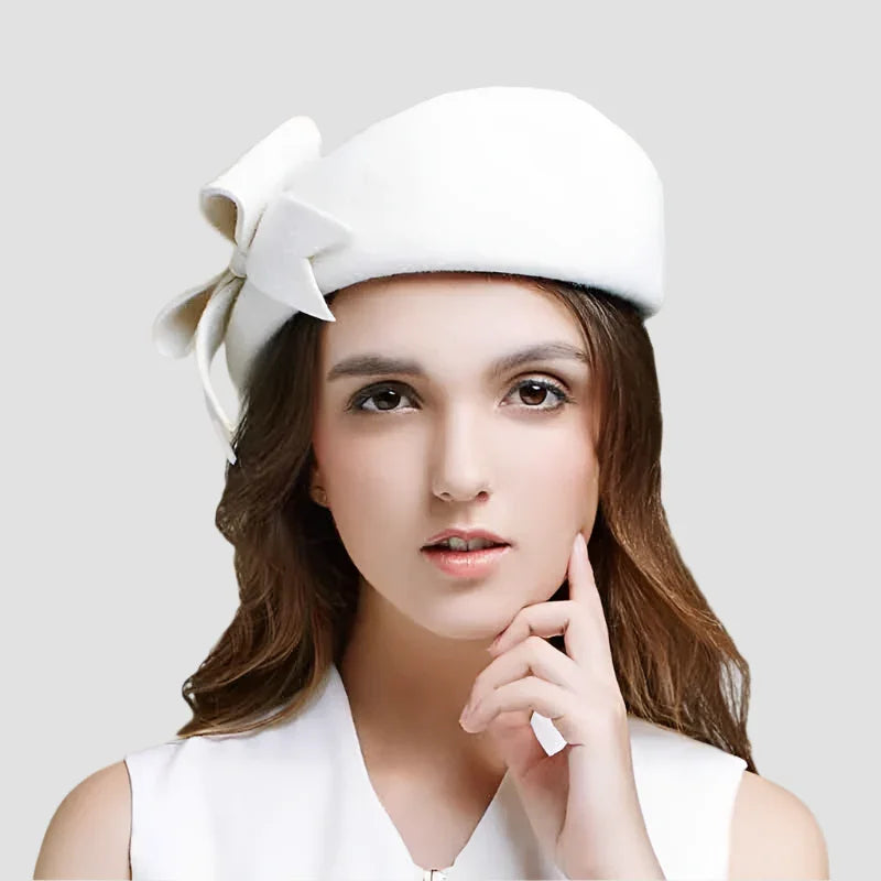 White hat with bow.