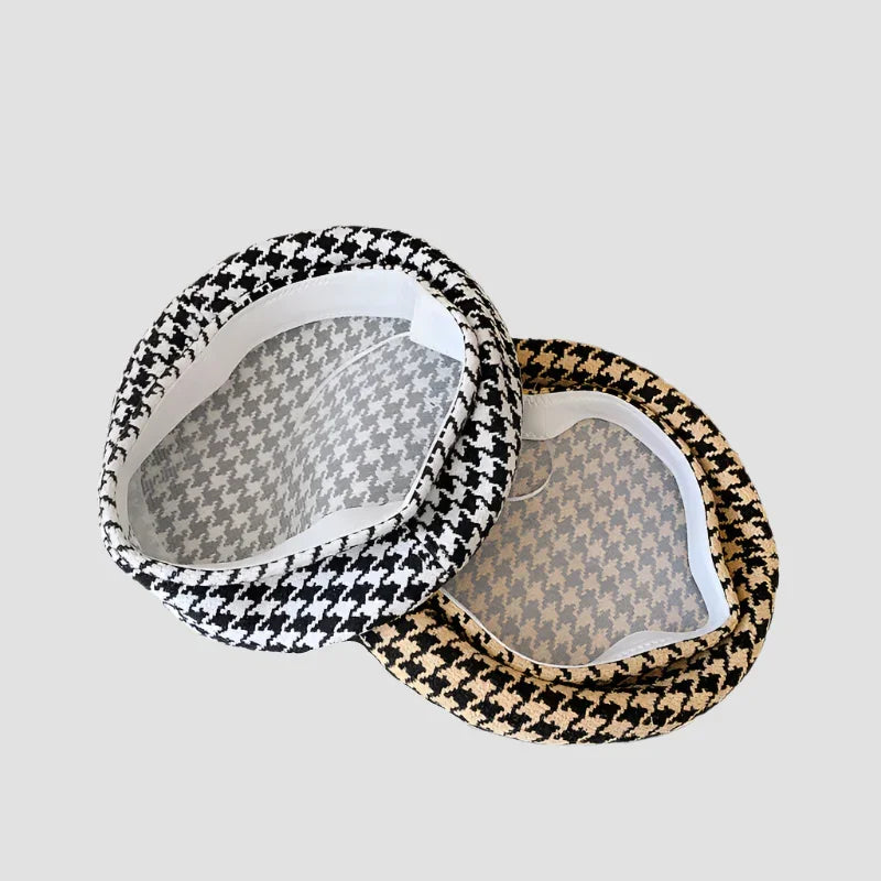 Two houndstooth berets.