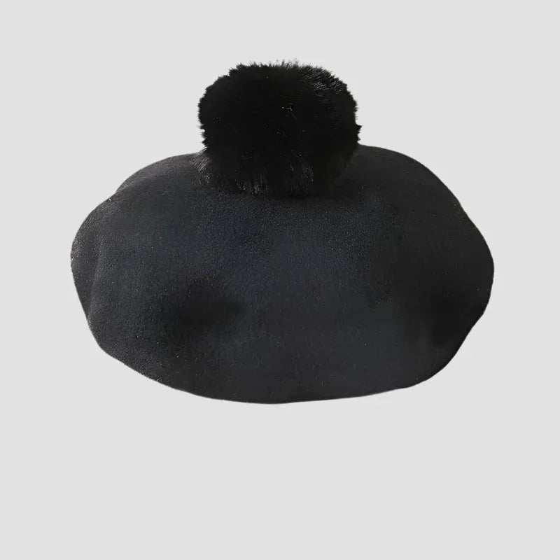 Black beret with pompom.