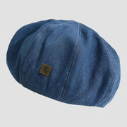 Blue denim newsboy cap.