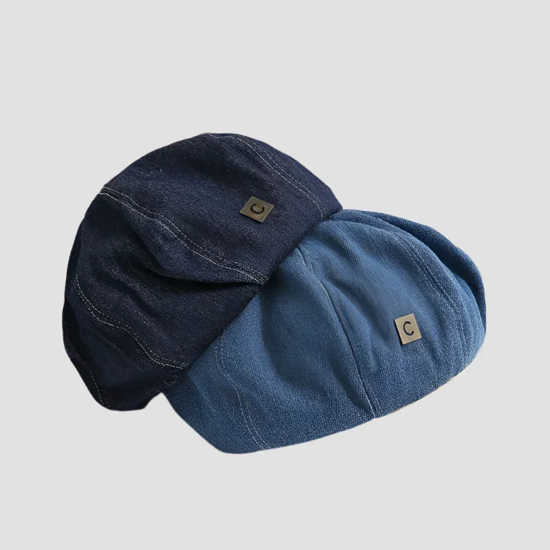Two denim flat caps.