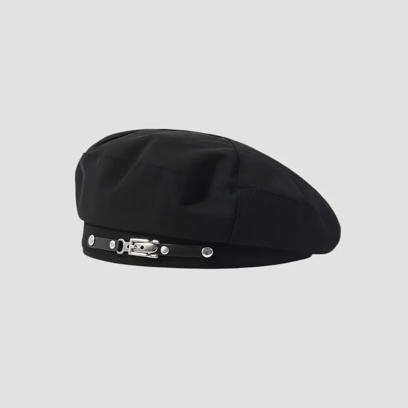 Black beret with decorative strap.