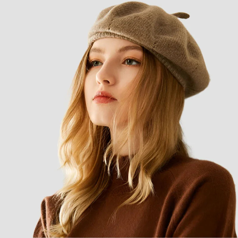 Beige knitted beret.