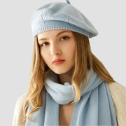 Light blue knitted beret and scarf.