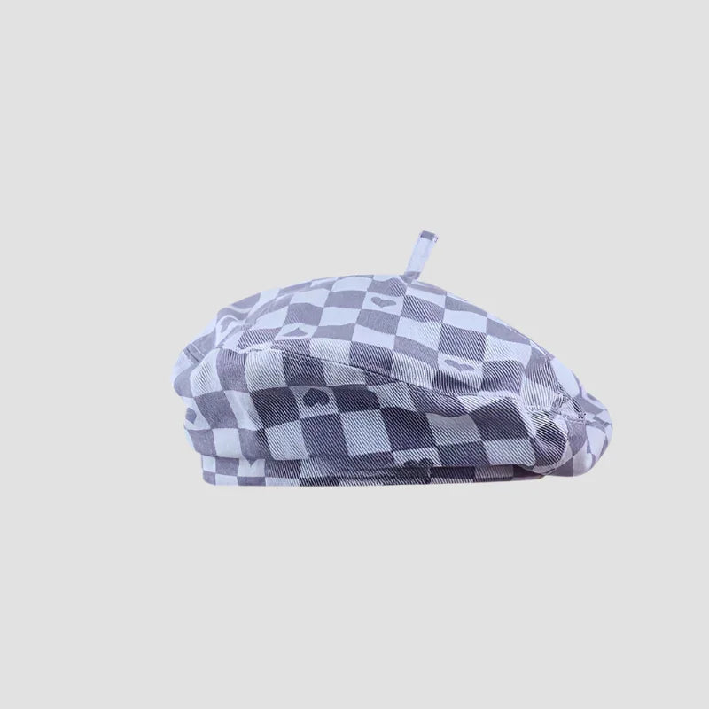 Gray and white checkered beret.