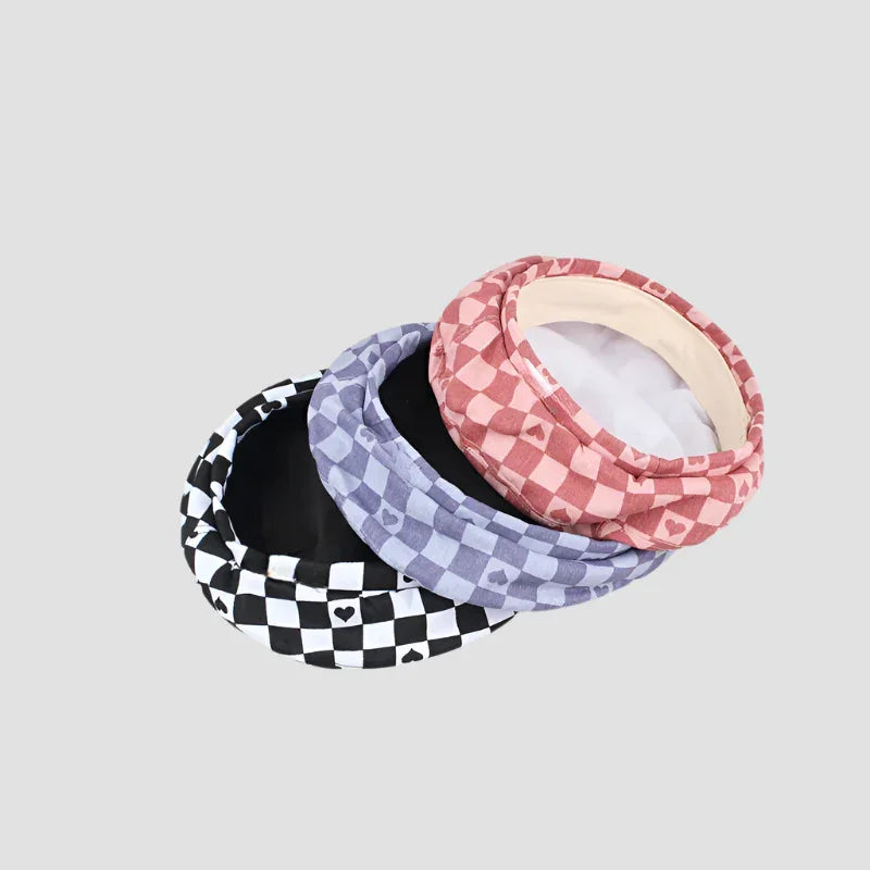 Three patterned headbands.