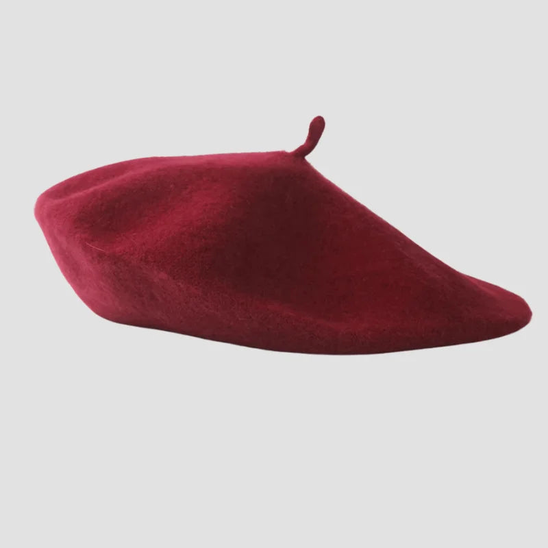 Maroon beret hat.