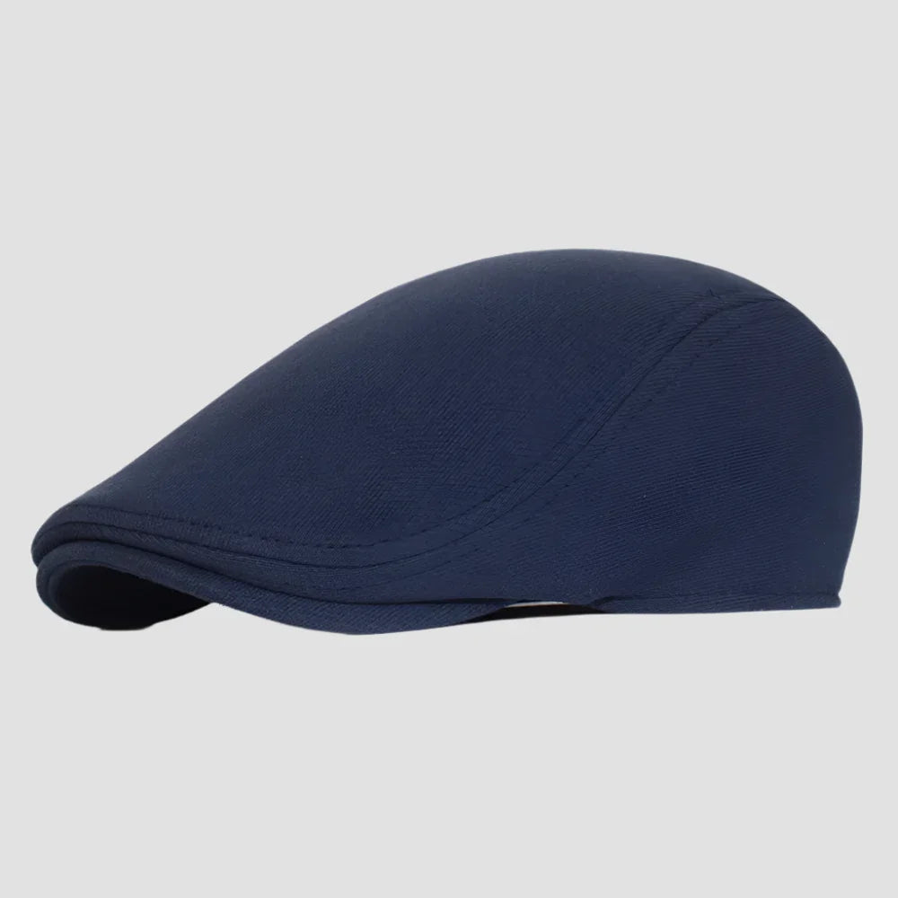 Navy blue flat cap.