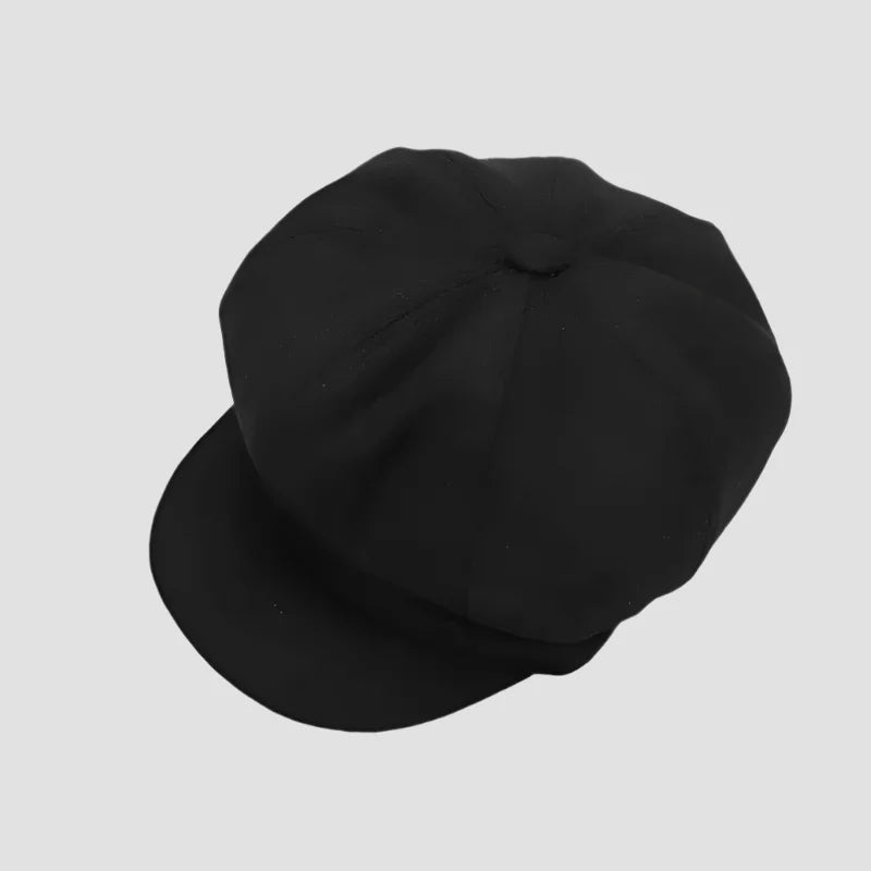 Black newsboy cap.