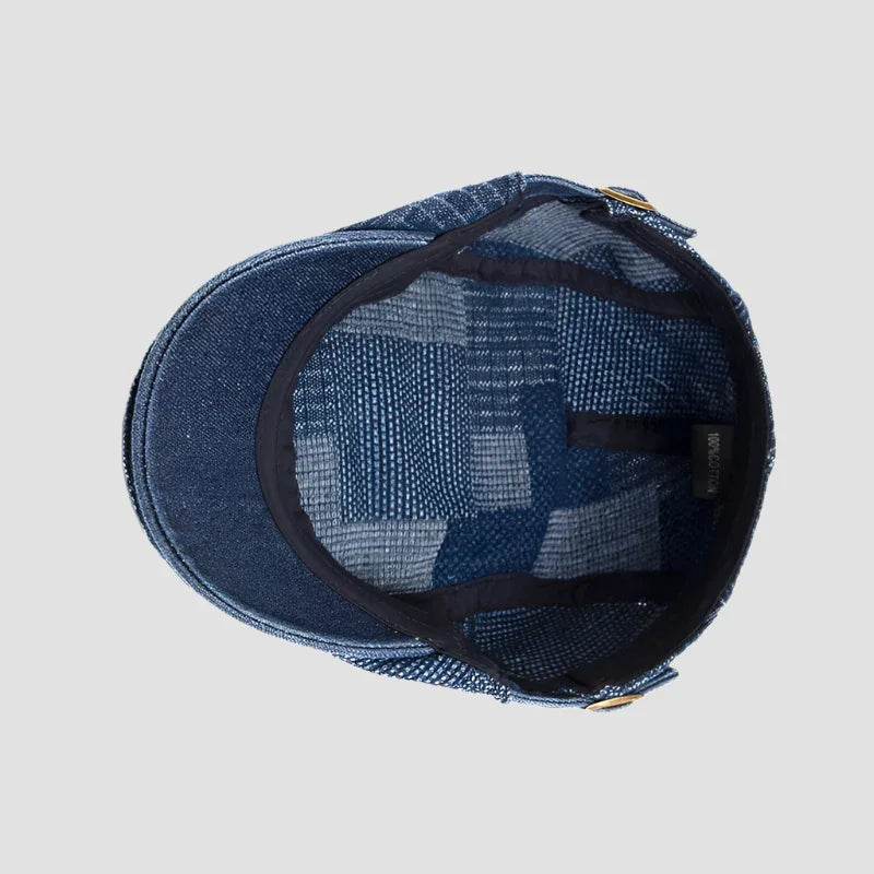 Blue patchwork newsboy cap.