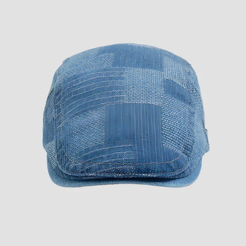 Blue patterned flat cap.