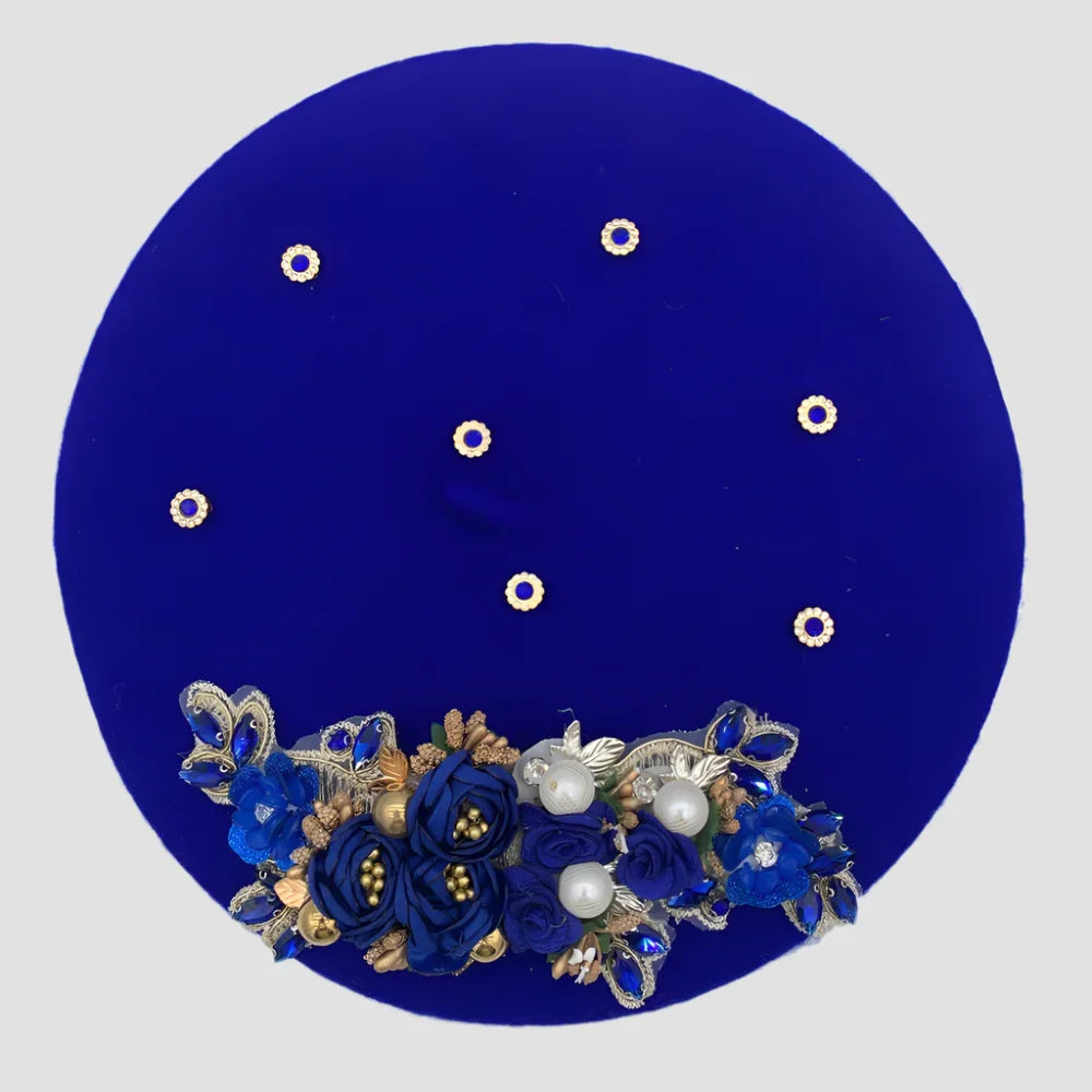 Round, blue, floral-decorated tray.