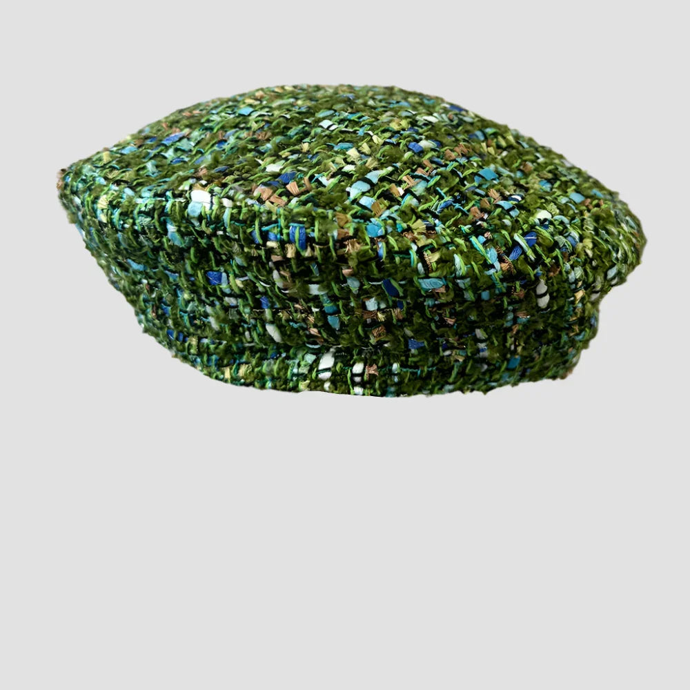 Green tweed beret.