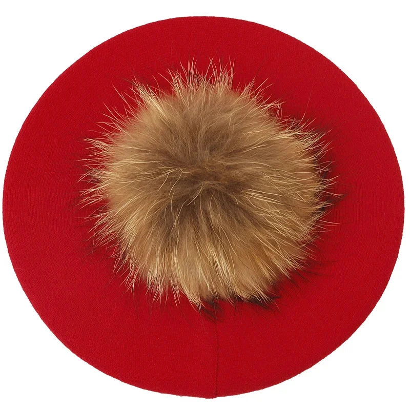 Red beret with fur pompom.
