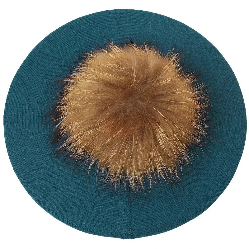 Teal beret with brown fur pompom.
