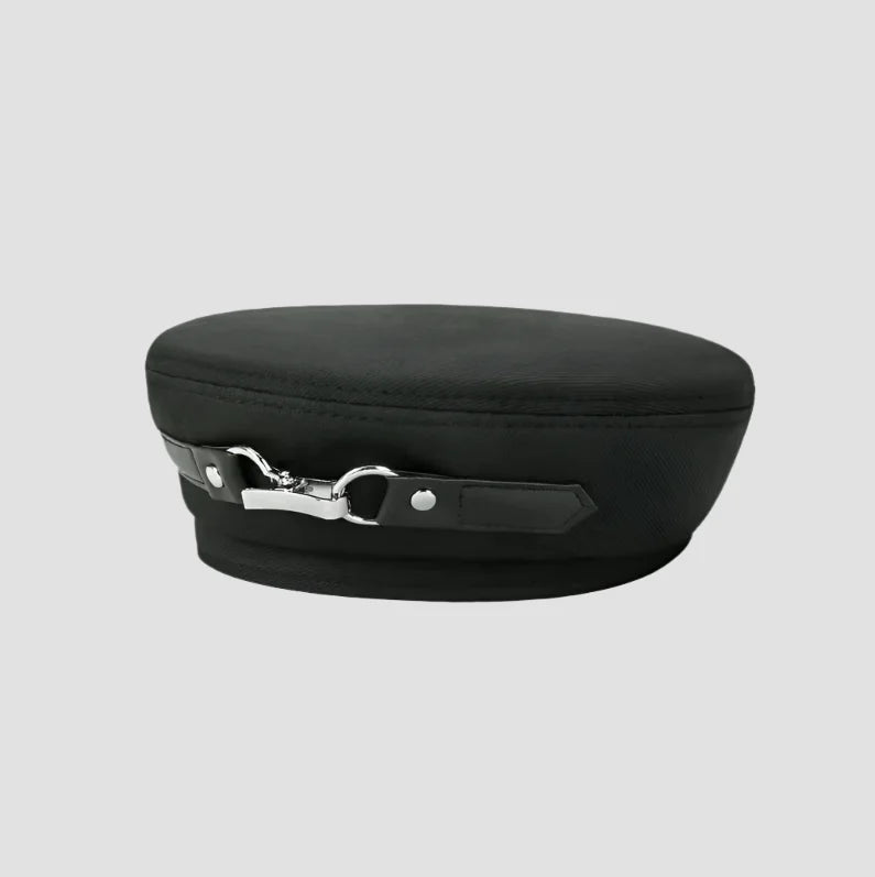 Black military-style hat with silver clasp.