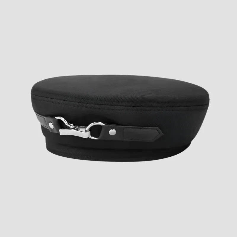 Black peaked cap with silver buckle.