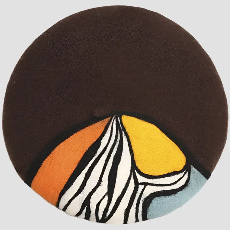 Brown beret with colorful design.
