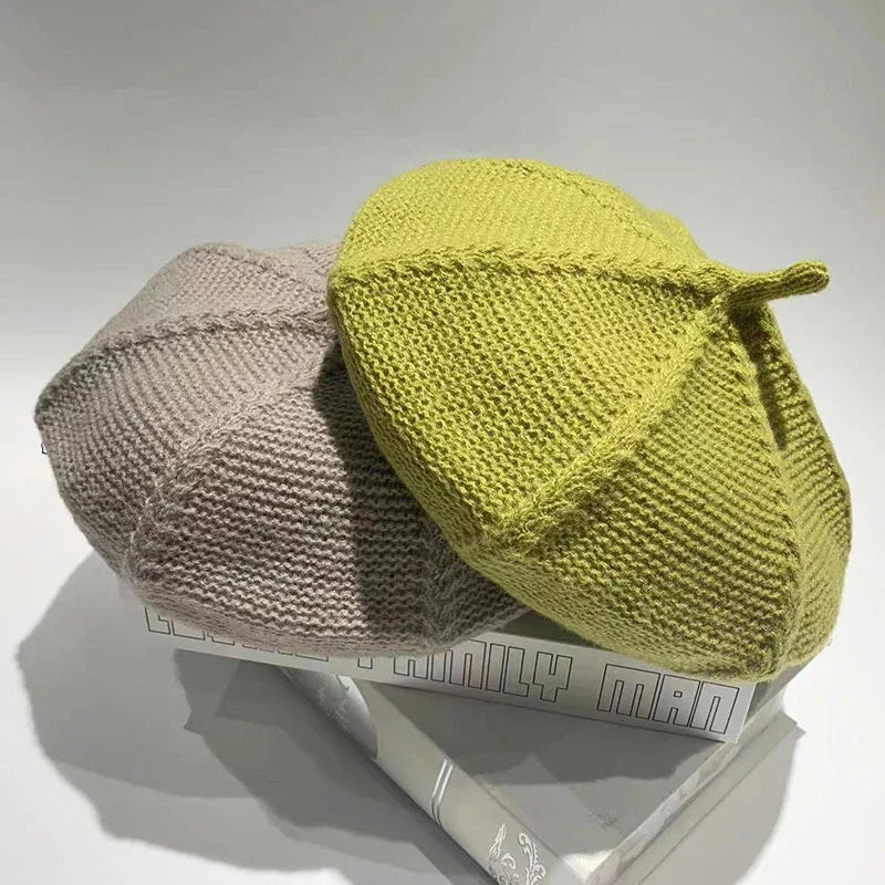 Two knitted berets.