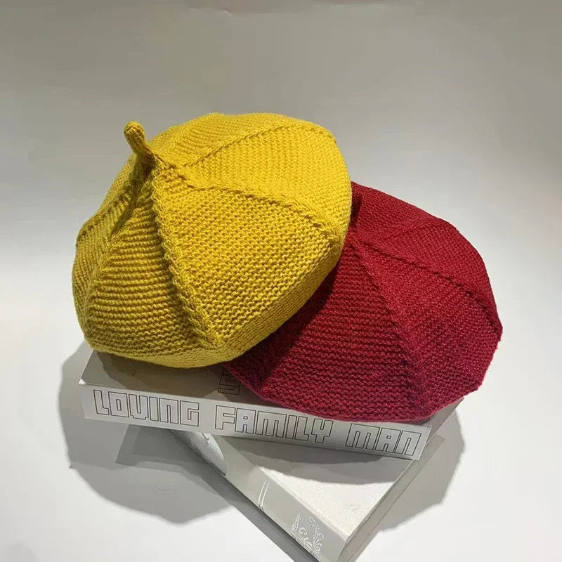 Two knitted berets.