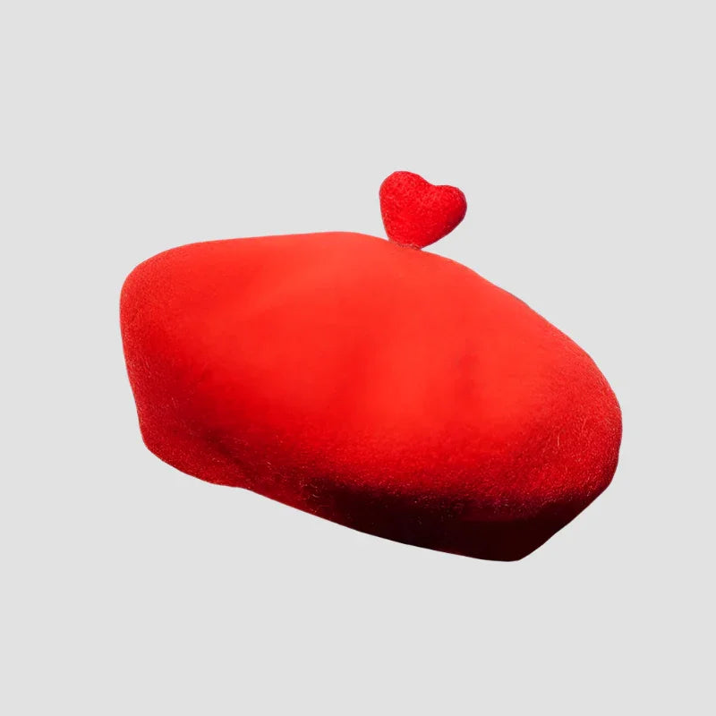 Red beret with heart accent.