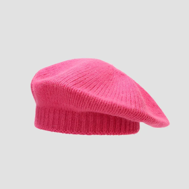 Bright pink knitted beret.