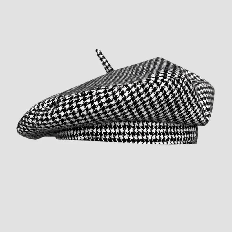 Houndstooth patterned beret.