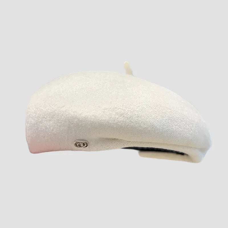Cream-colored wool beret.