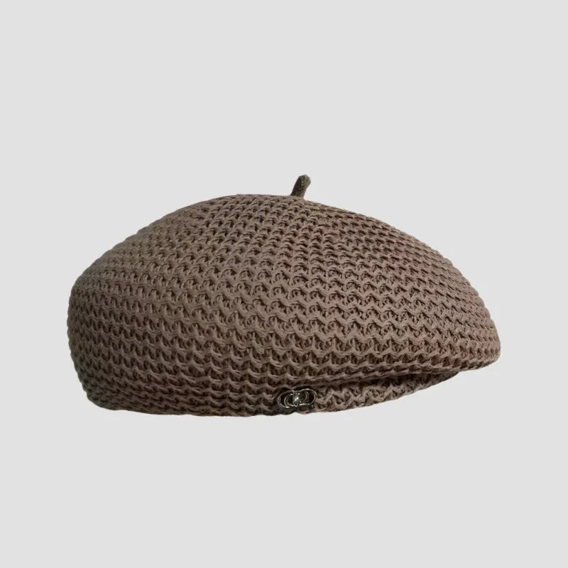 Brown knitted beret.