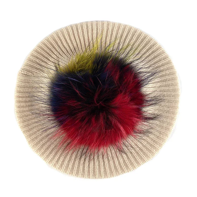 Beige knit hat with colorful pompom.