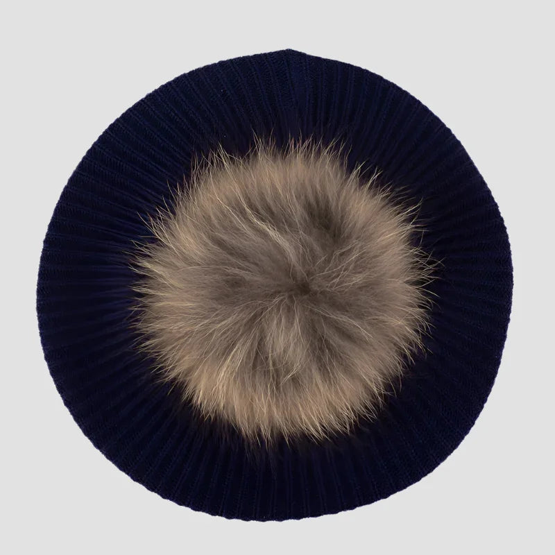 Navy knit beret with fur pompom.