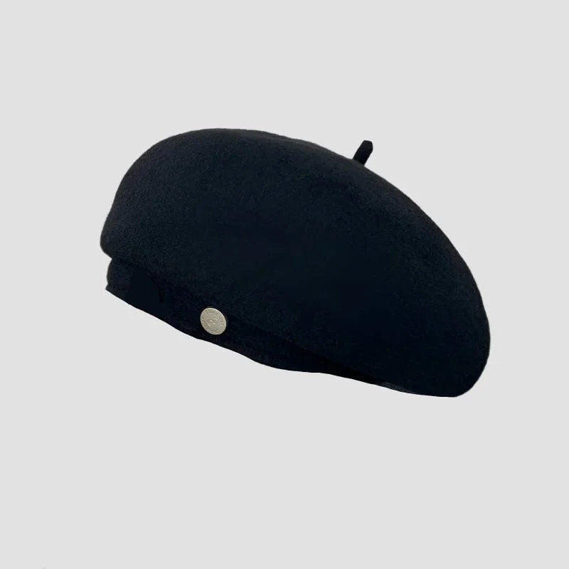 Black beret with silver button.