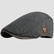 Gray tweed flat cap.