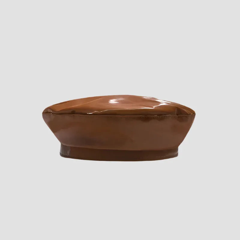 Brown shiny beret.