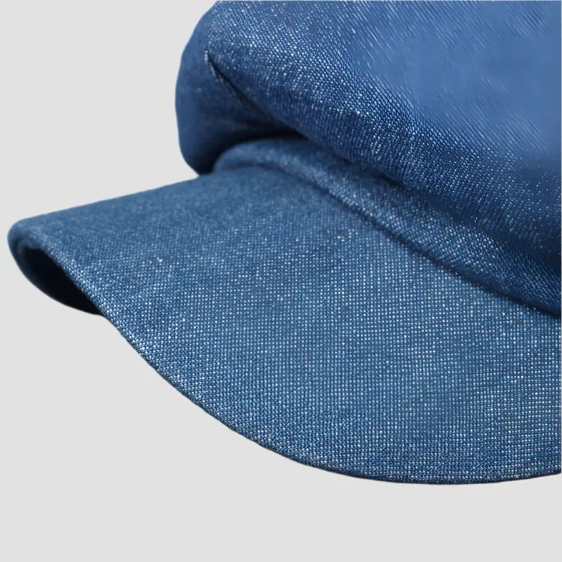 Blue denim newsboy cap.