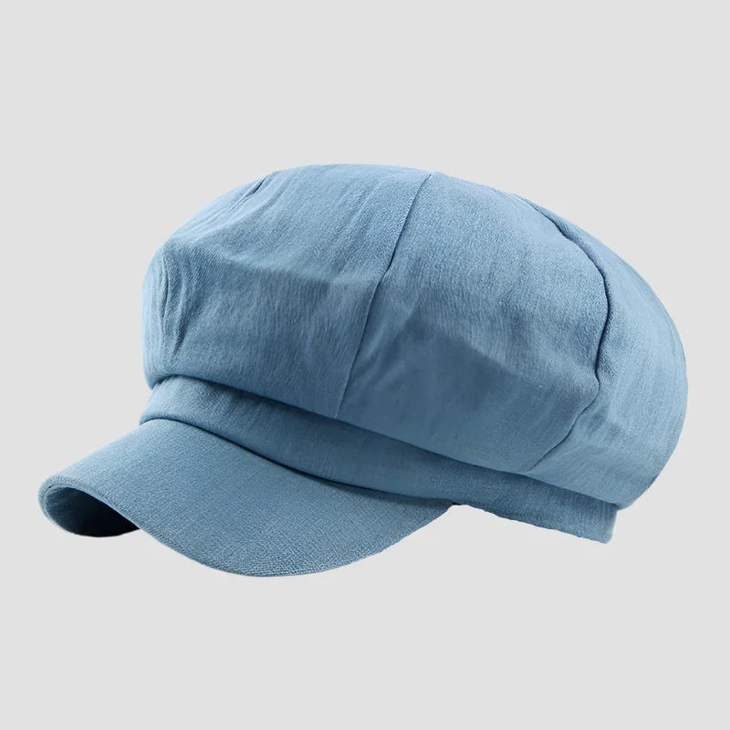 Light blue newsboy cap.