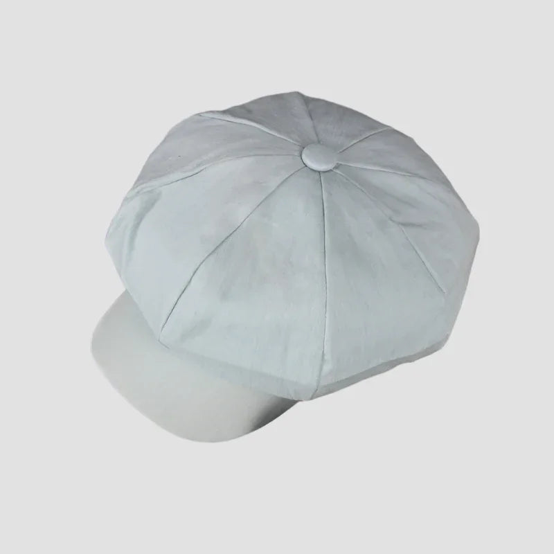 Light blue newsboy cap.