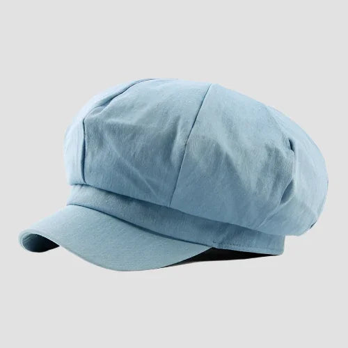 Light blue newsboy cap.