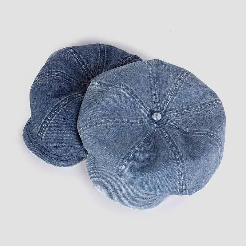 Two denim newsboy caps.