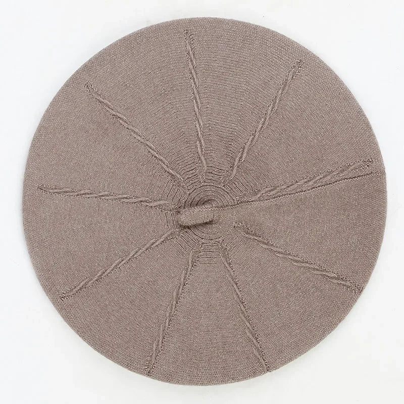 Knitted mauve beret.