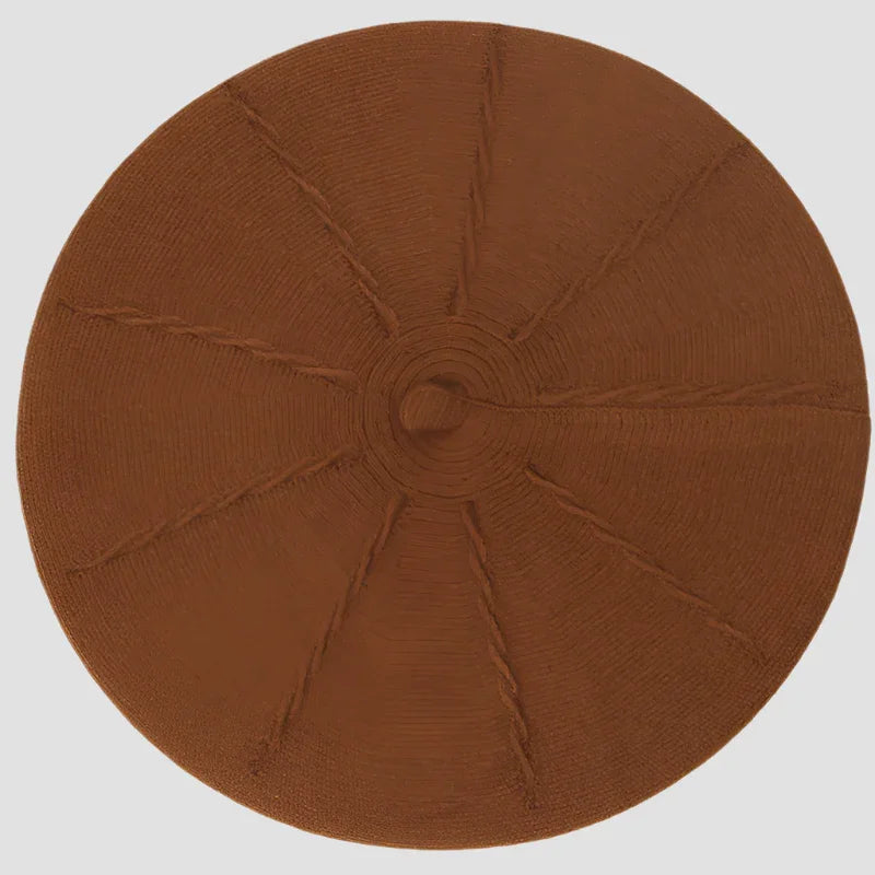 Round, brown woven rug.
