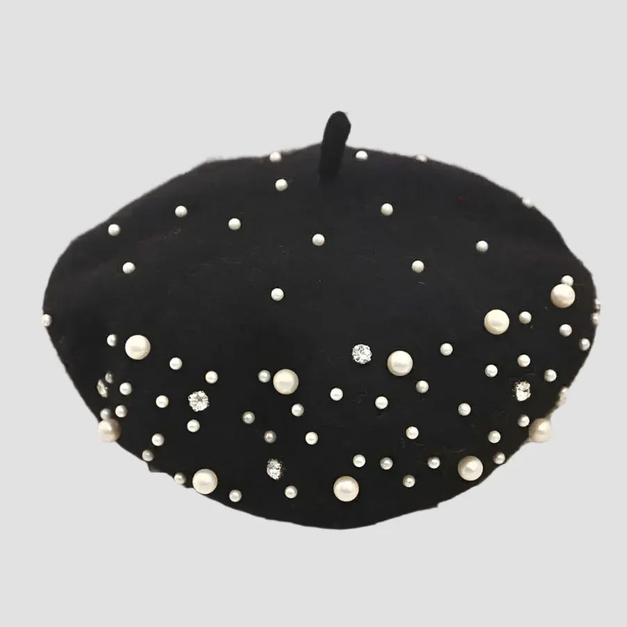 Black beret with pearl and rhinestone embellishments.